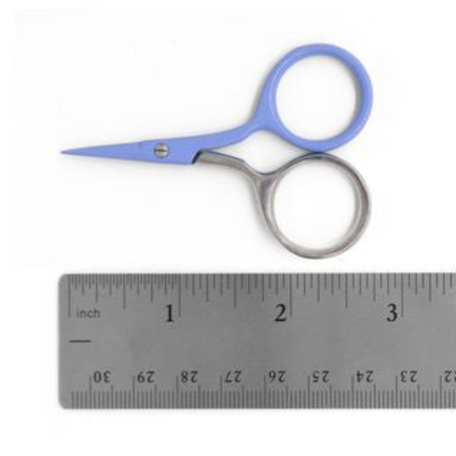 Small blue-handled scissors with a silver metal blade and ring handle, shown above a stainless steel ruler for size reference on a white background.