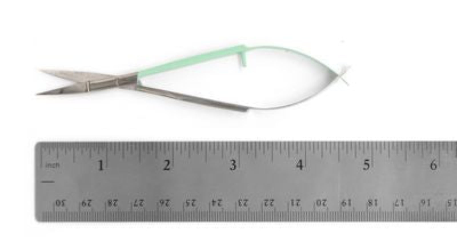 A pair of small metal snips with a mint green handle, shown above a metal ruler to indicate scale on a white background.