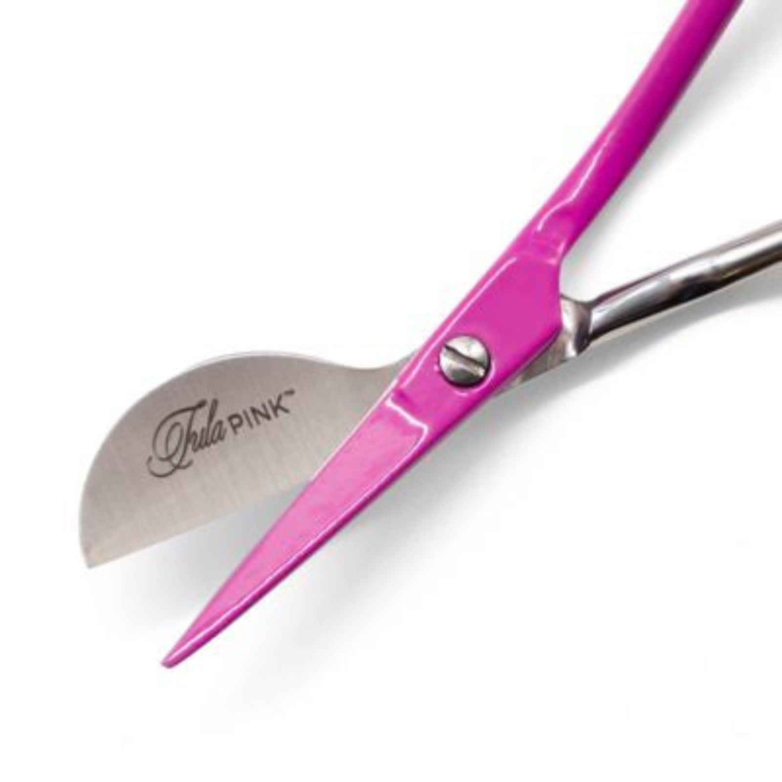 A close-up of a pair of hair shears with bright pink handles and silver metal blades, featuring the brand name 'Tula PINK' printed on one blade, set against a plain white background.