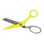 Bright yellow fabric shears with silver metal blades and handles, featuring the text 'FABRIC ONLY' on the blade, set against a plain white background.