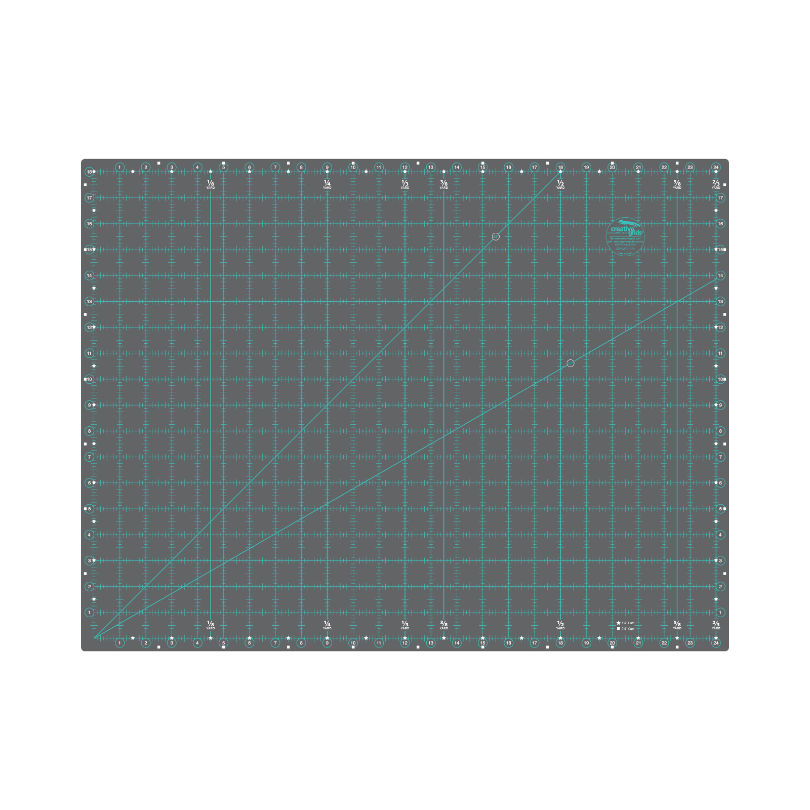 A square dark gray cutting mat with a teal grid pattern, diagonal guide lines, and white measurement markings on a plain white background.