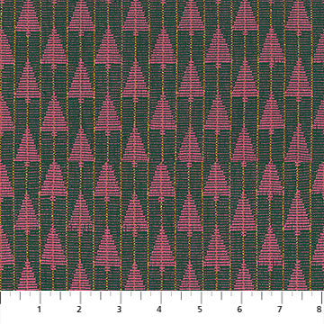 Woven pattern of pink trees on a green background with a ruler for scale