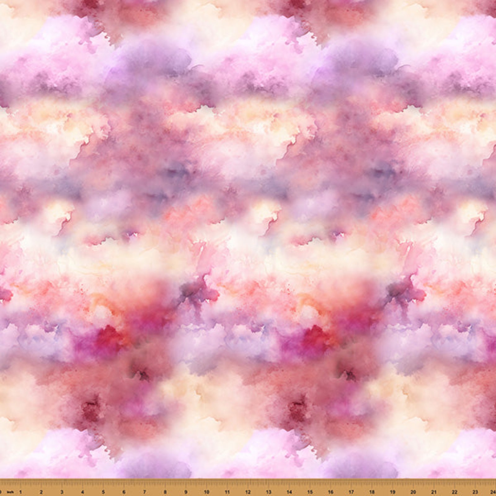 Cloudy sky pattern with pink and purple hues on a fabric background