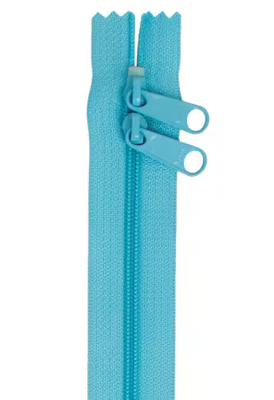 Light blue zipper on a white background