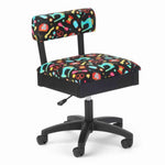 A swivel chair with a black five-star base and casters, featuring a colorful patterned fabric on the seat and backrest.