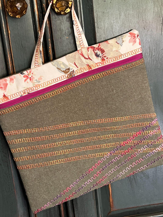 Project bag created in the Baby Lock Days: Serger Sorcery class at Quilting Mayhem, showcasing decorative serger stitching and professional finishing.