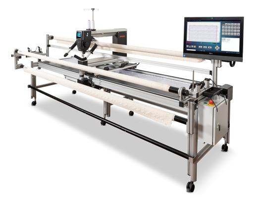 BERNINA Q‑Series longarm on a frame with Q‑matic automation showing the touchscreen interface and layered quilt setup