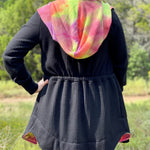 Back view of the Camden Cardigan showing the hood and waist shaping on a finished garment