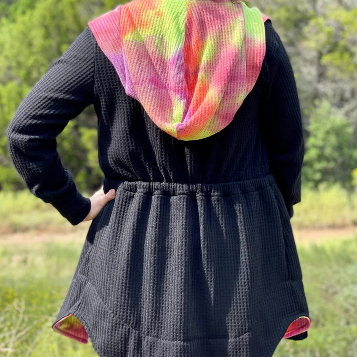 Back view of the Camden Cardigan showing the hood and waist shaping on a finished garment