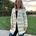 Front view of the Camden Cardigan worn outdoors, showing the garment’s waist shaping and open‑front design