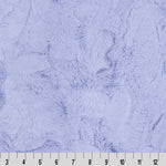 Light lavender plush faux fur fabric texture with a white ruler at the bottom edge showing measurements.