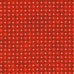 A close-up of a red-orange fabric or material swatch with a repeating small floral pattern in pink, white, and dark red.