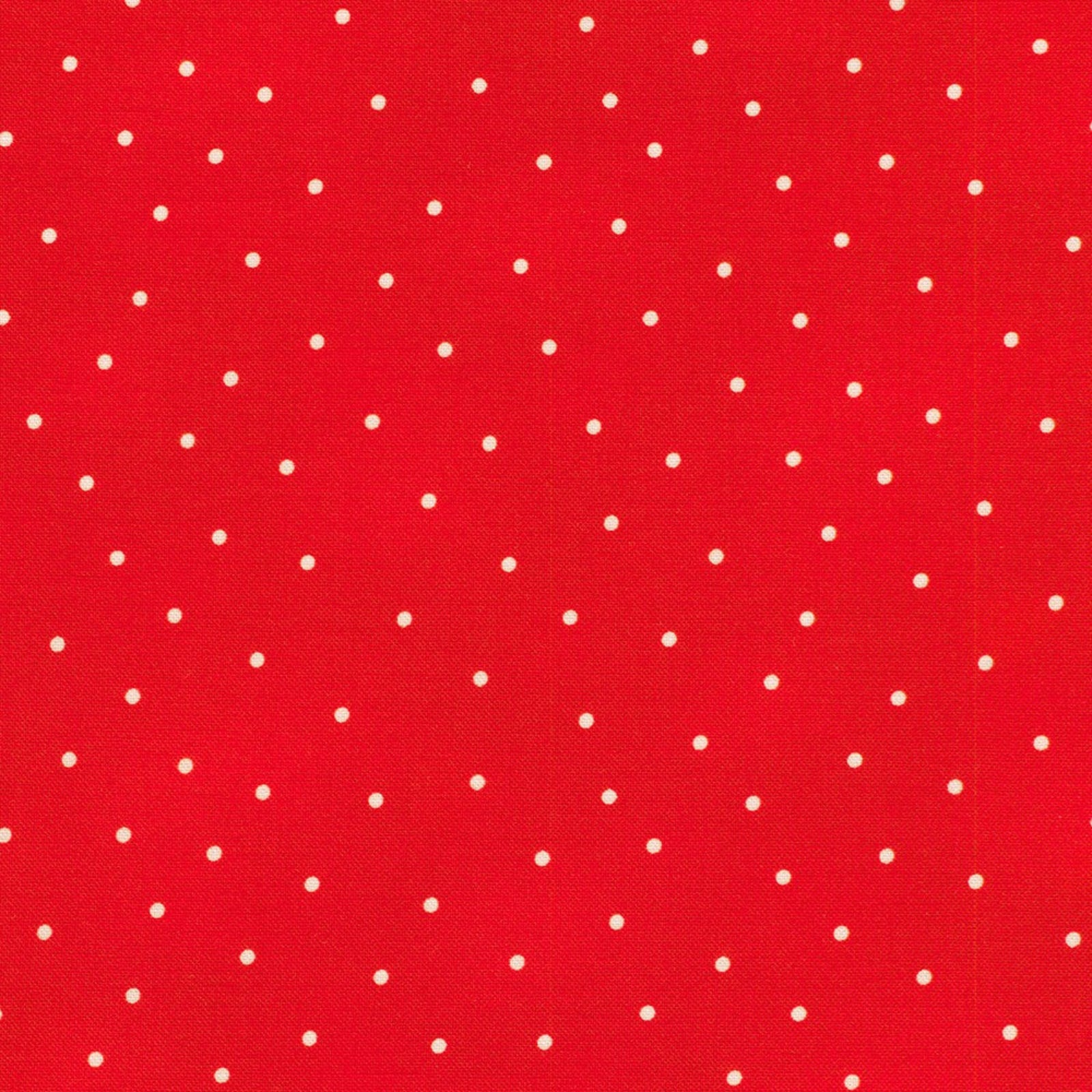 Red fabric with a repeating pattern of small white polka dots.