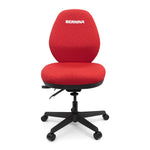 A red fabric office desk chair with a black five-star wheeled base. The brand name 'BERNINA' is printed in white on the backrest.
