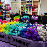 Display of Cozy Craft Coven yarn at a previous trunk show event.