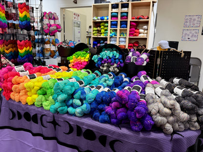 Display of Cozy Craft Coven yarn at a previous trunk show event.