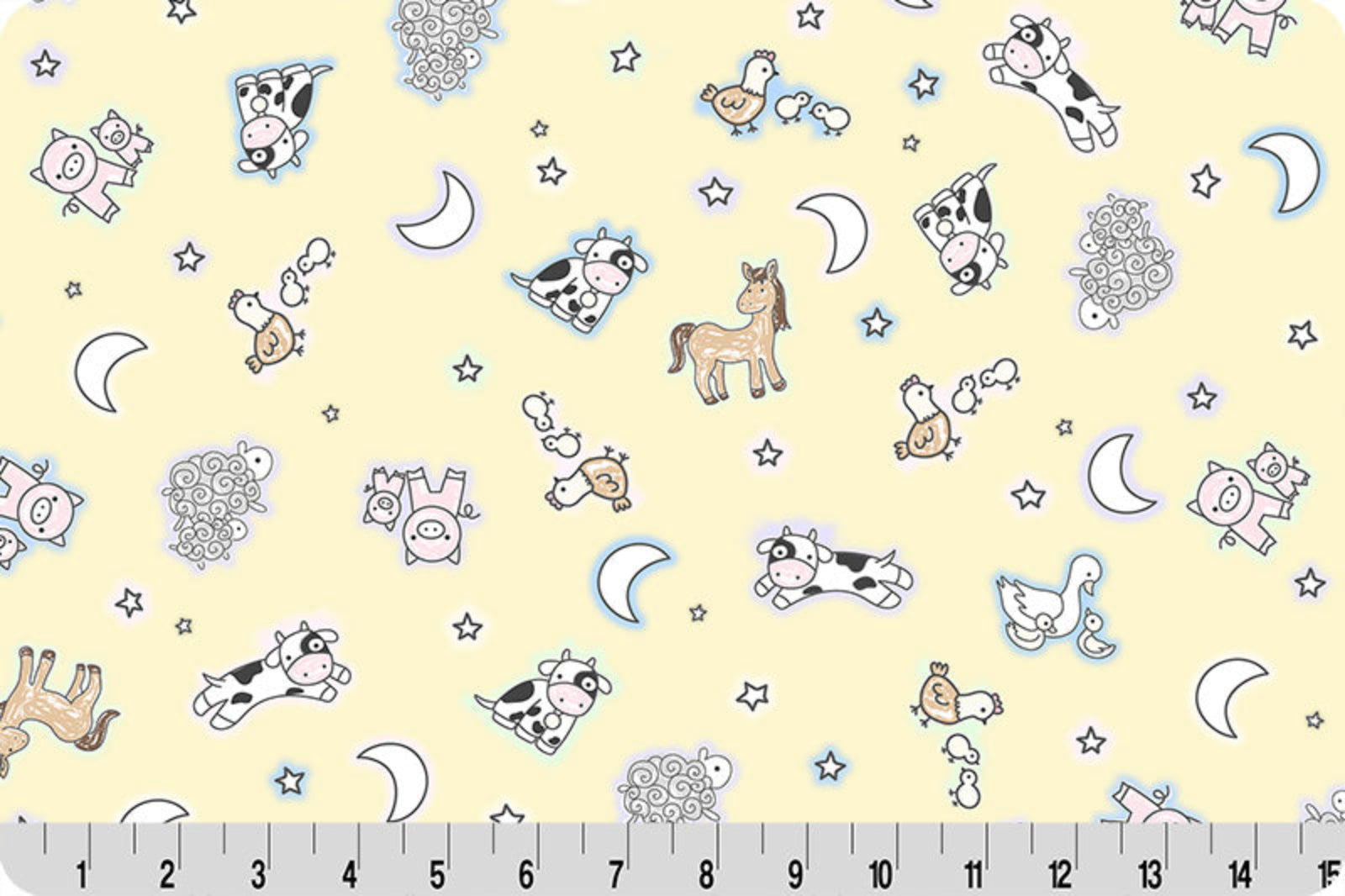 Children's fabric with animal and nature patterns on a yellow background