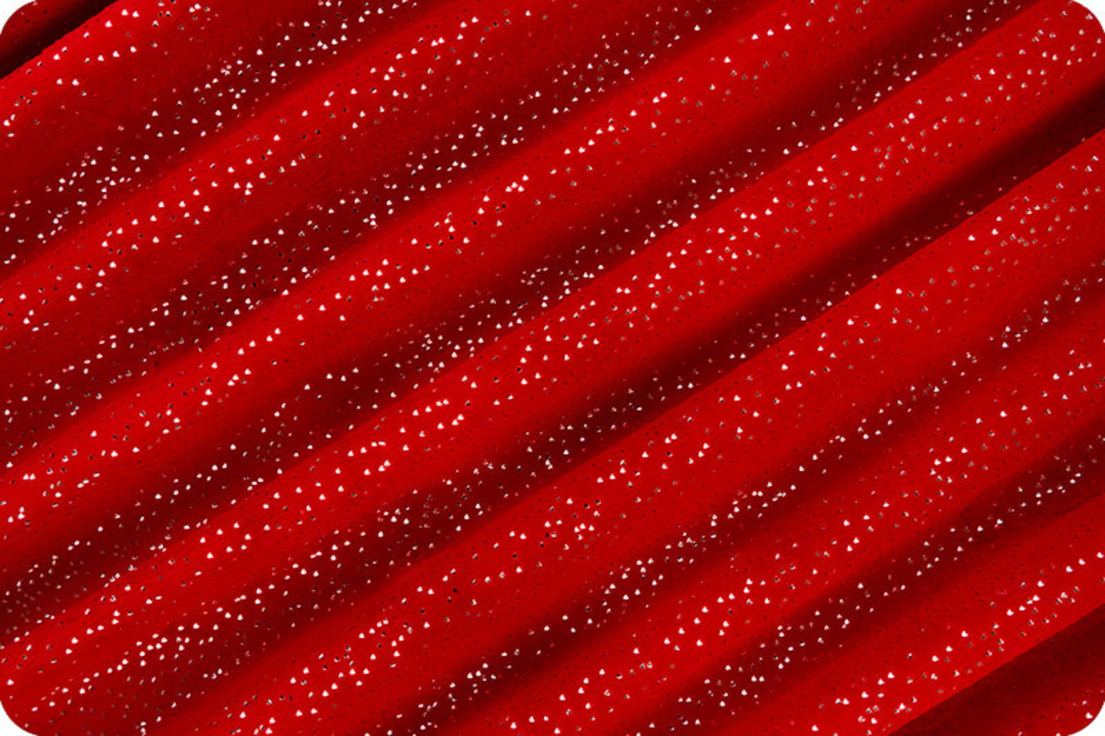 A close-up of red fabric with a diagonal striped pattern created by folds, covered in small white speckles.