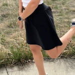 Person wearing a handmade skort from the Sulky Tee & Skort Workshop, shown in a side view
