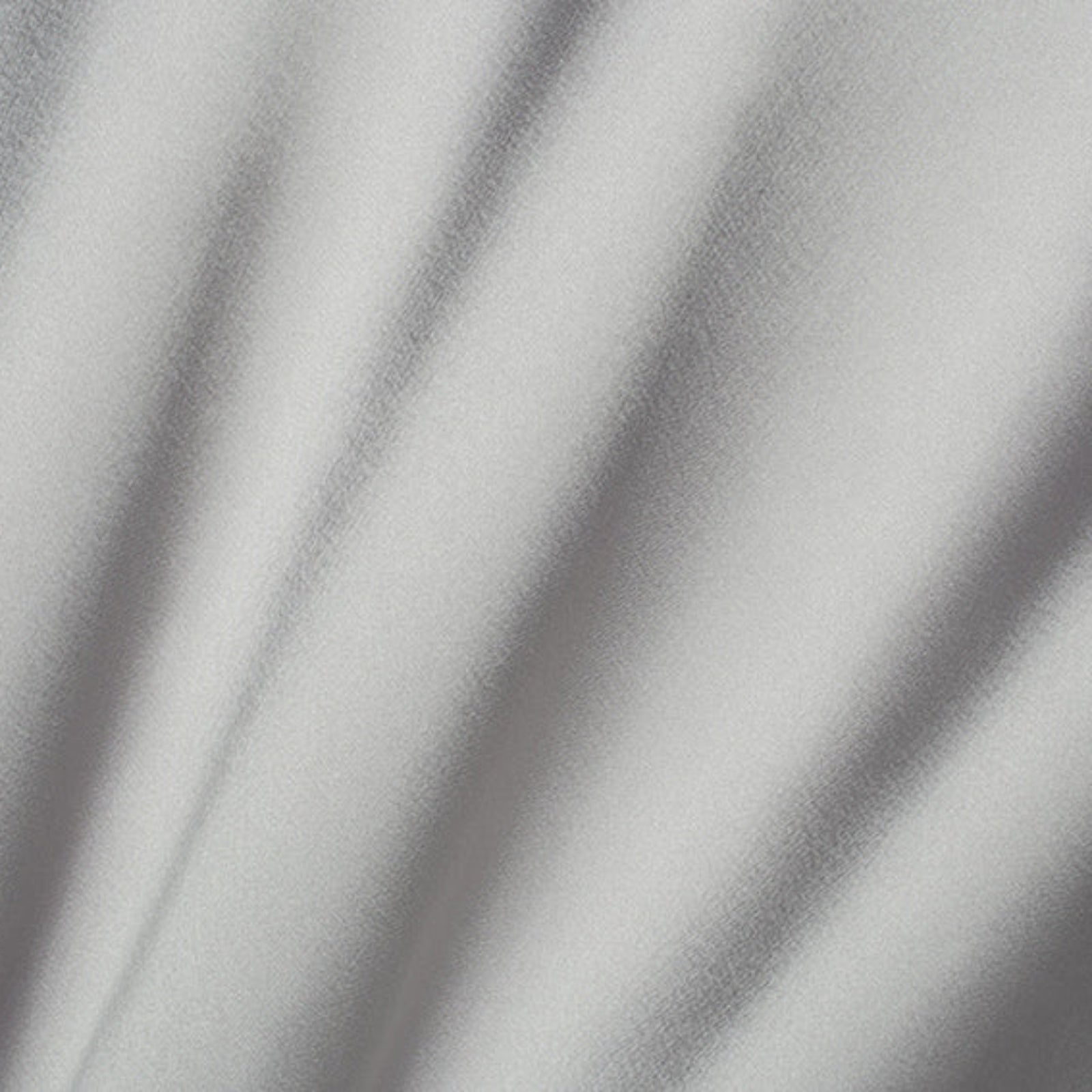 Close-up of gray fabric with folds