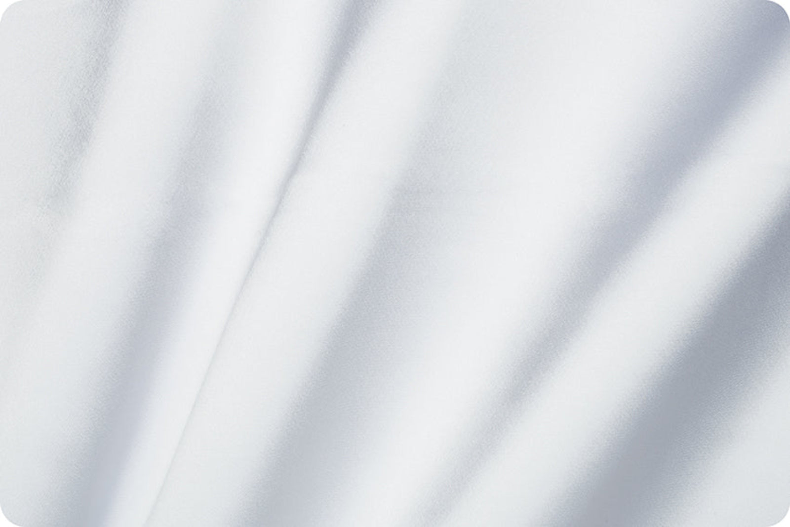 A close-up of draped white fabric with soft folds and a smooth texture.